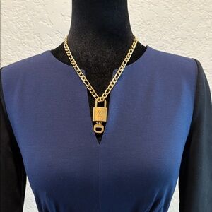 Louis Vuitton #309 Lock and Key Gold Brass with new unbranded chain